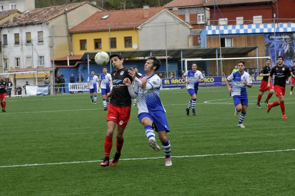 El partido entre el Tuilla y el Langreo, en imágenes