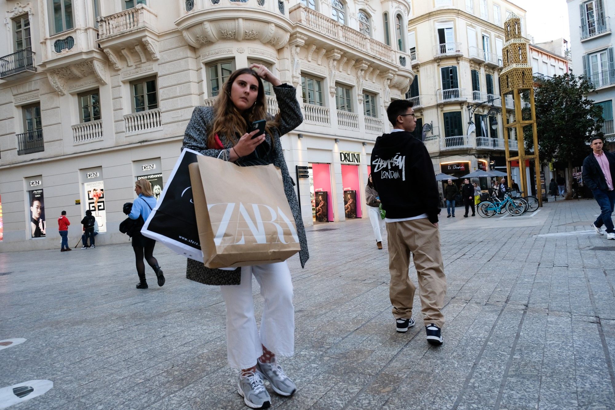 Primer día de las rebajas de enero en el Centro de Málaga