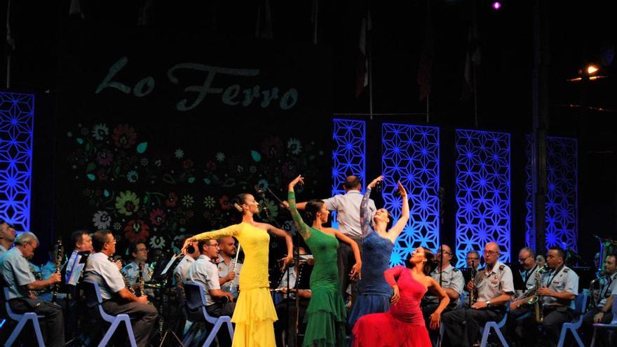 Las bailaoras danzan al son de la Unidad Musical de la AGA en su 75º aniversario