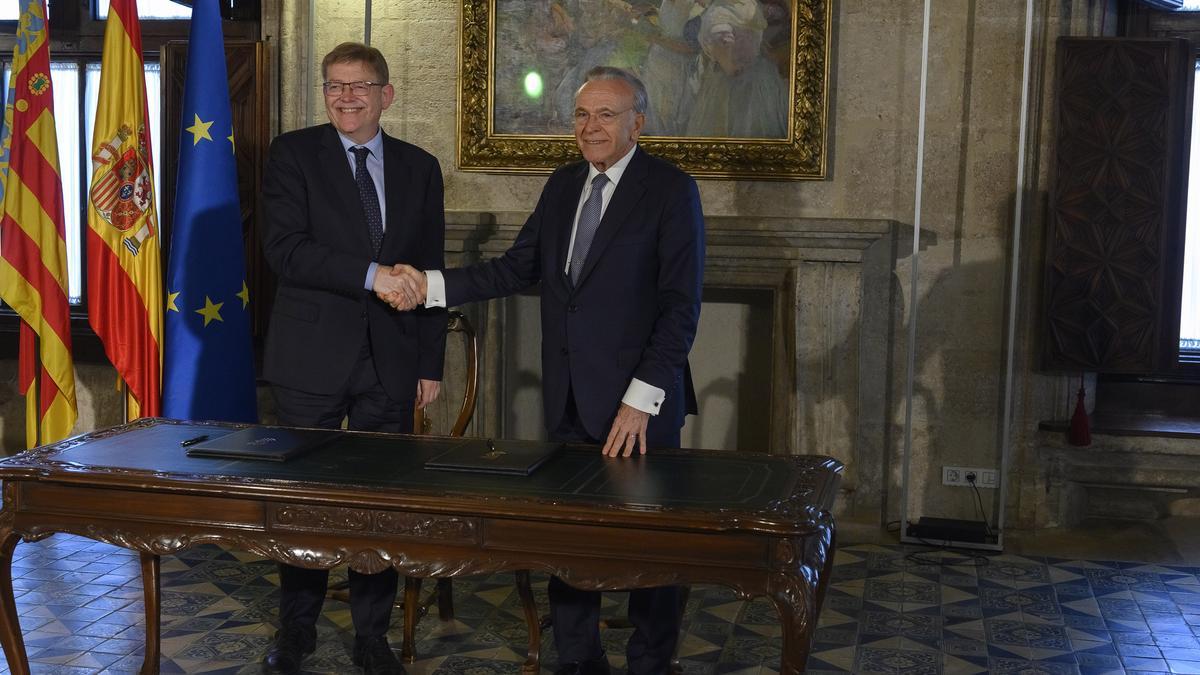 El presidente de la Generalitat Valenciana, Ximo Puig, y el presidente de la Fundación ”la Caixa”, Isidro Fainé.