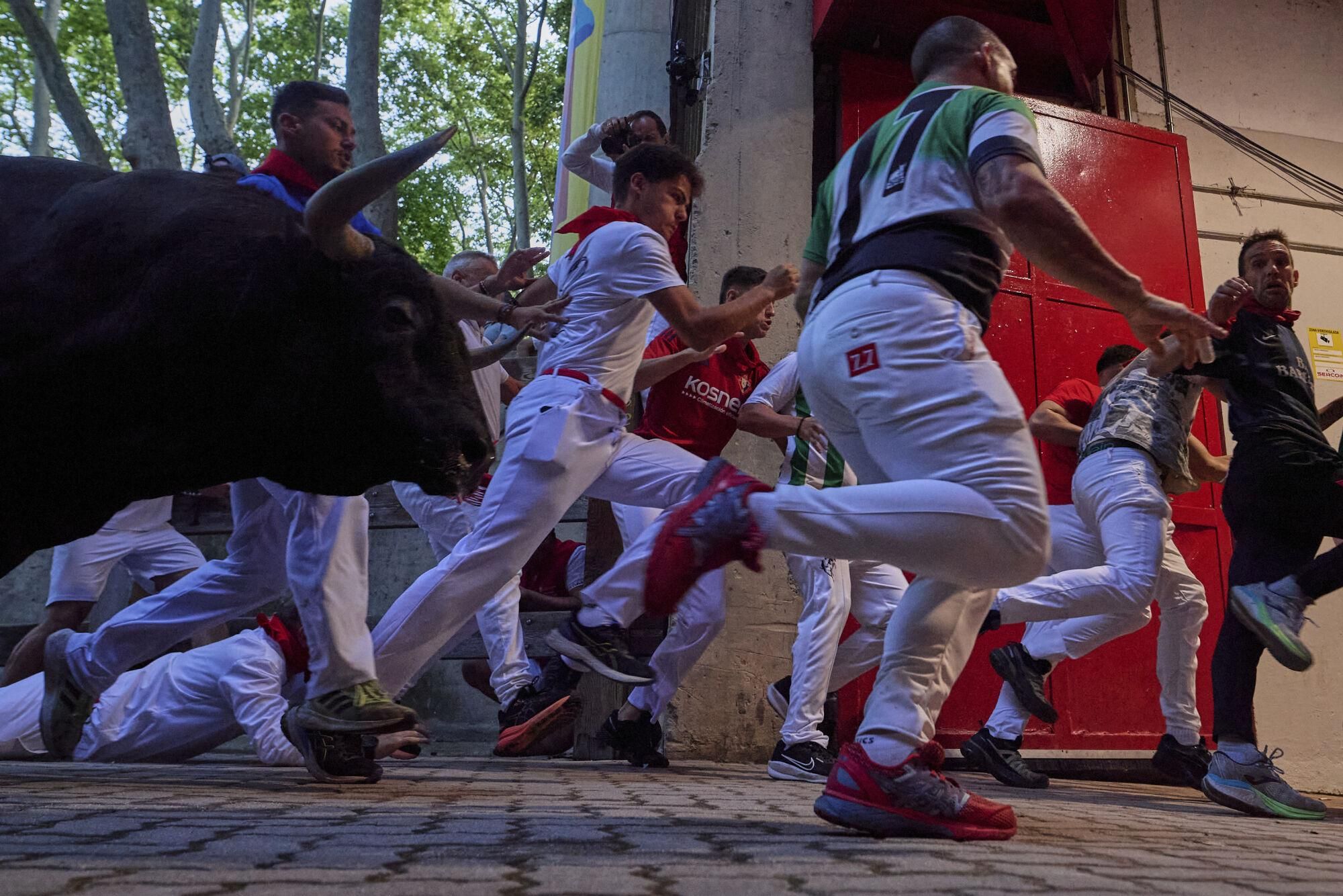 El quinto encierro de los Sanfermines 2025, en imágenes.