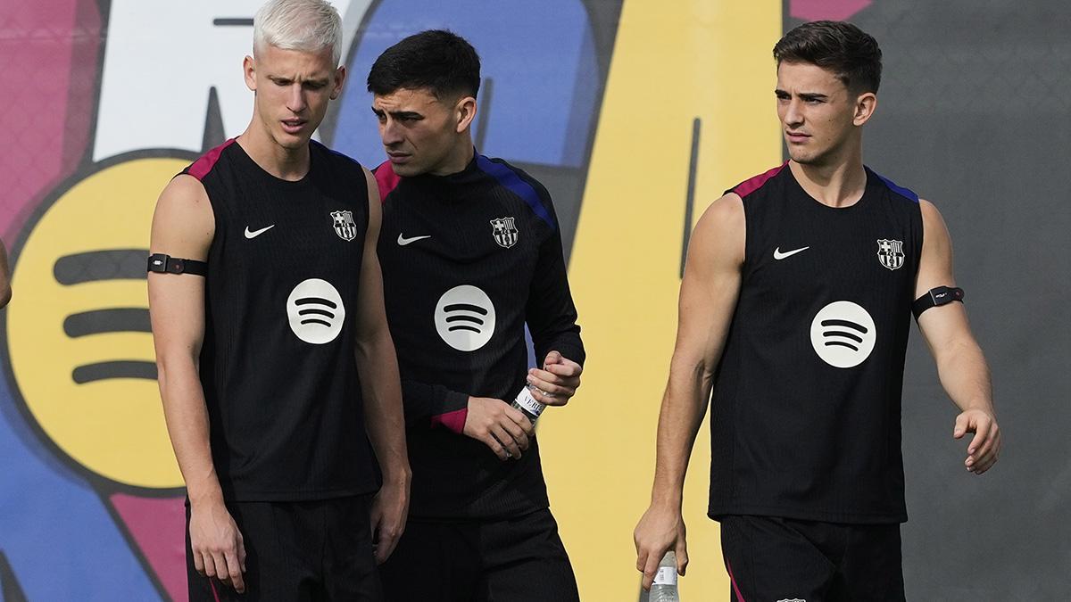 Dani Olmo, Gavi y Pedri durante el entreno previo al Clásico