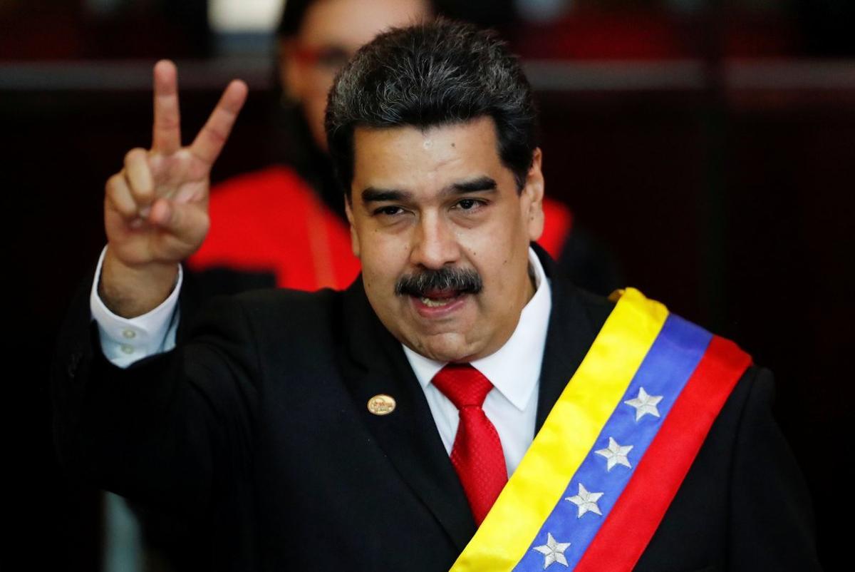 FILE PHOTO  Venezuelan President Nicolas Maduro gestures after receiving the presidential sash during the ceremonial swearing-in for his second presidential term  at the Supreme Court in Caracas  Venezuela Jan  10  2019  REUTERS Carlos Garcia Rawlins File Photo
