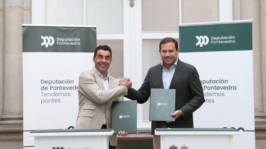 Luis López, junto a Jorge Cubela.