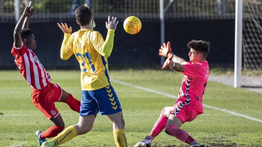 Una acció del Girona B-Palamós, dos equips gironins de Primera Catalana.