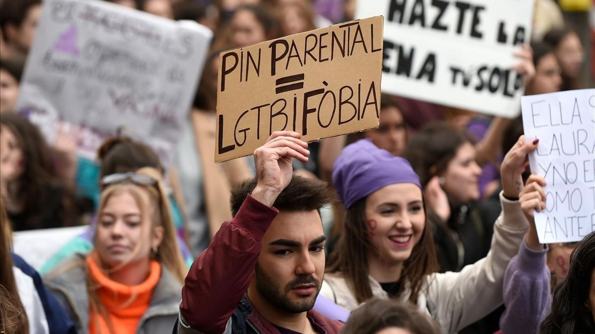 zentauroepp52656741 a student holds a sign reading  parental pin equals lgbtq ph200312122220