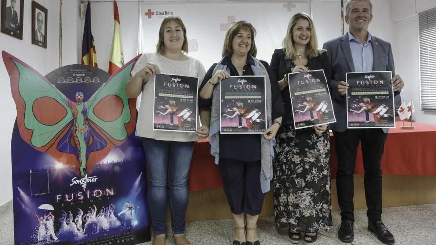 Mary Martínez, Rosa de Lima y Mateu Ballester en la sede de Cruz Roja de Balears.