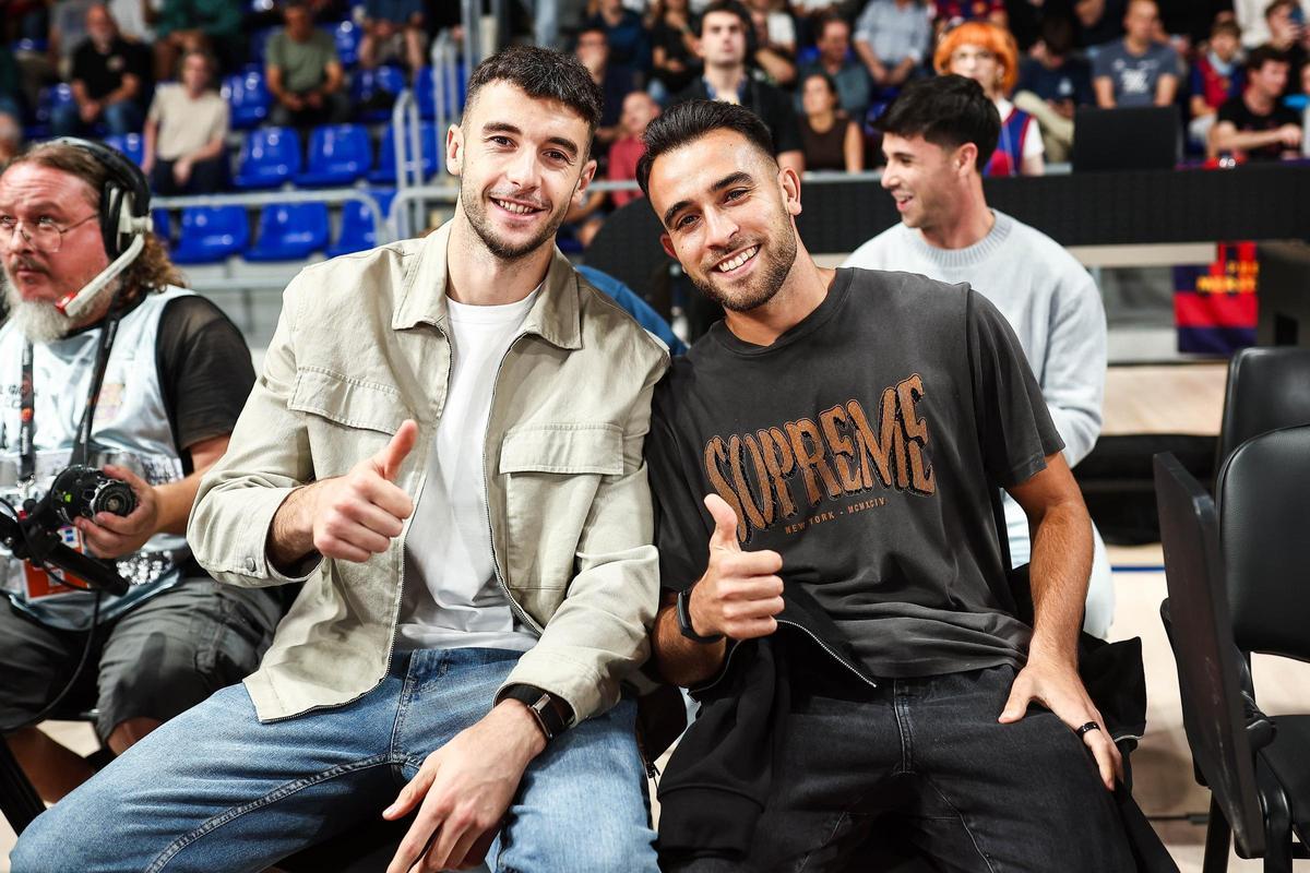 Joan García i Eric Garcia, amb seients a peu de pista al Palau Blaugrana