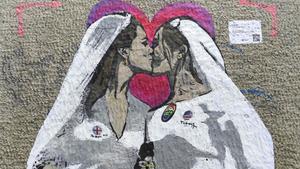 ’The Royal Kiss’, las duquesas Kate Middleton y Meghan Marklen retratadas por TVBoy.