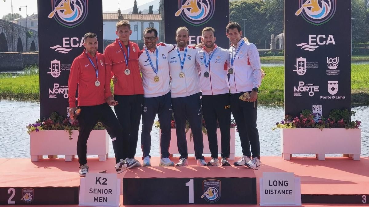 El podio, con Llorens y Plaza a la derecha.