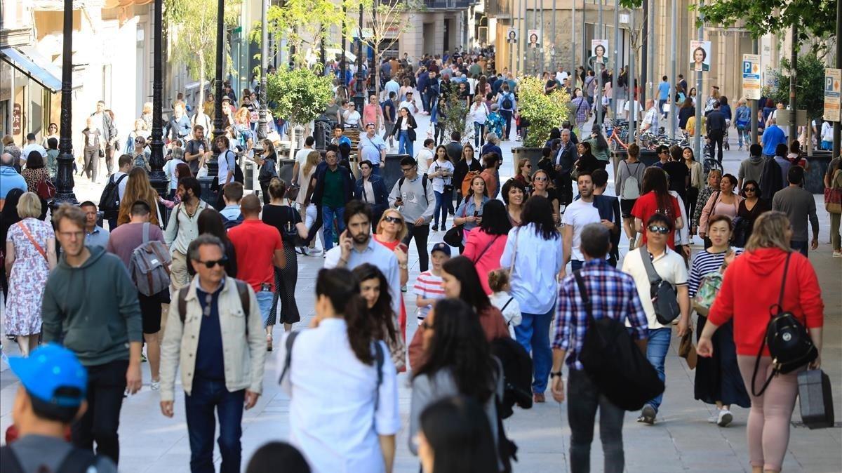 Ambiente en el Portal de l’Àngel, una de las principales calles comerciales de Barcelona.