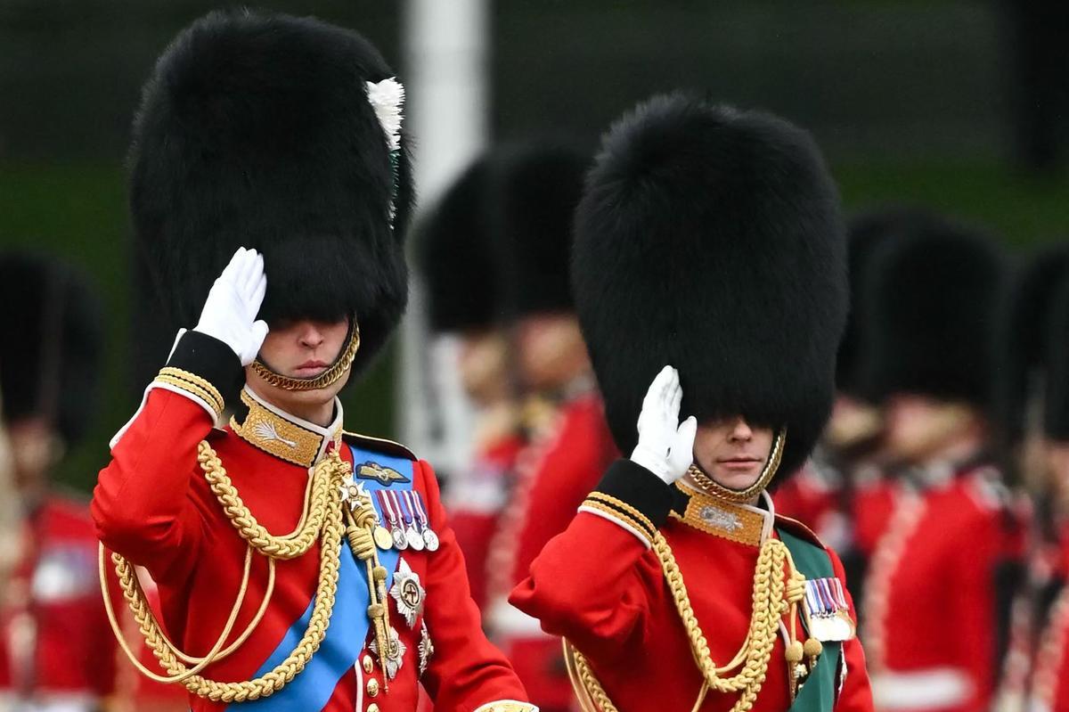 Britains Prince William, Prince of Wales (L) and Britains Prince Edward, Duke of Edinburgh (R) perform on Horse Guards Parade for the Kings Birthday Parade, Trooping the Colour, in London on June 15, 2024. The ceremony of Trooping the Colour is believed to have first been performed during the reign of King Charles II. Since 1748, the Trooping of the Colour has marked the official birthday of the British Sovereign. Over 1500 parading soldiers and almost 300 horses take part in the event. (Photo by JUSTIN TALLIS / AFP)
