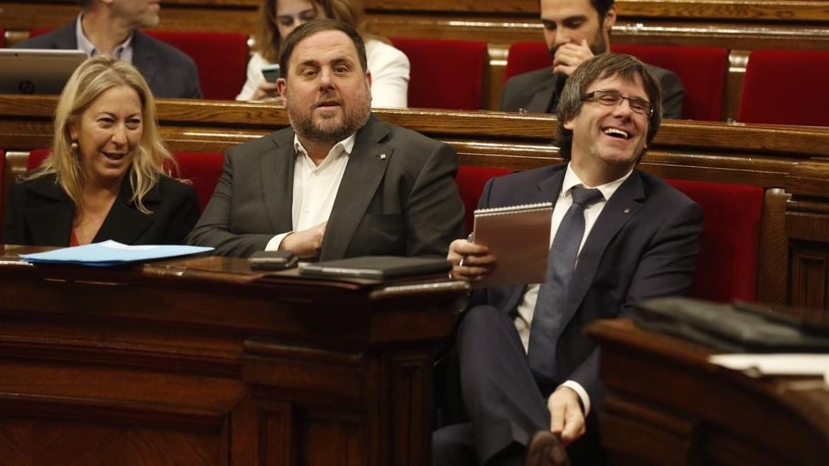 Neus Munté, Oriol Junqueras y Carles Puigdemont