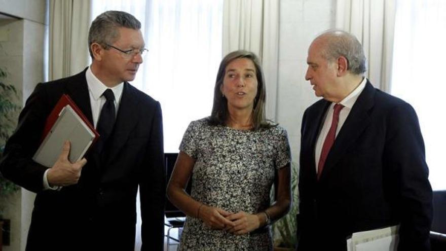 Alberto Ruiz-Gallardón, Ana Mato y Jorge Fernández. | efe