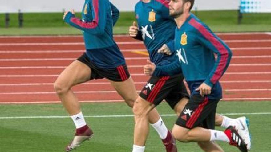 Daniel Ceballos, Sergio Ramos y Nacho Fernández durante el entrenamiento de ayer.