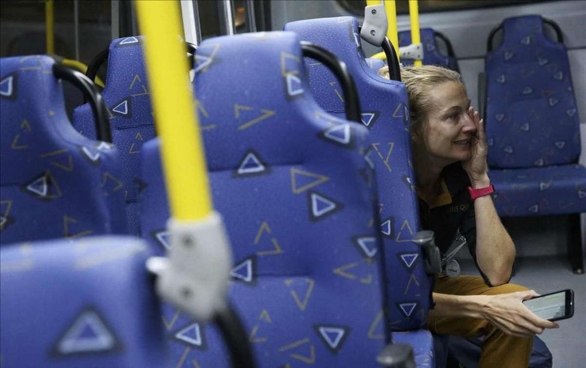 segea35039995 journalist joanna moyse cries on an official media bus after160810135314