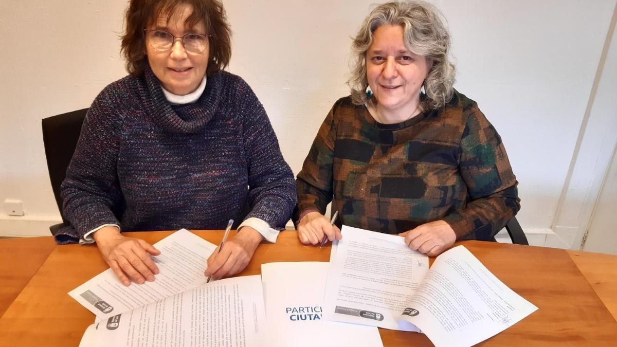 Lange y Plomer, en la firma del convenio.