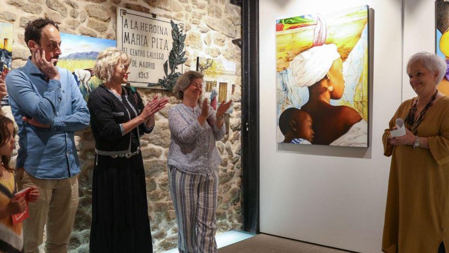 Geni Ramil, á dereita, na inauguración da exposición. |  Germán Barreiros/Roller Agencia
