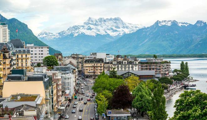 Montreux cityscape: lake Geneva and Alps