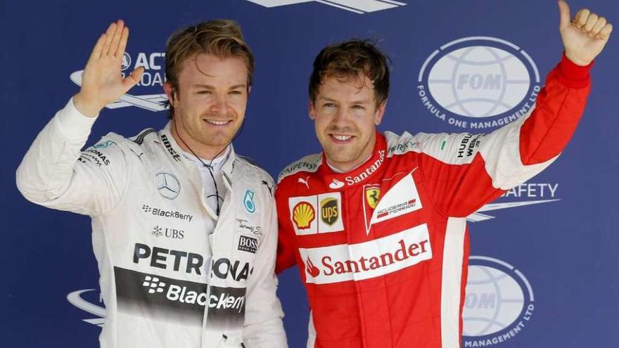 Rosberg y Vettel, primero y segundo en la calificación de ayer. // Efe