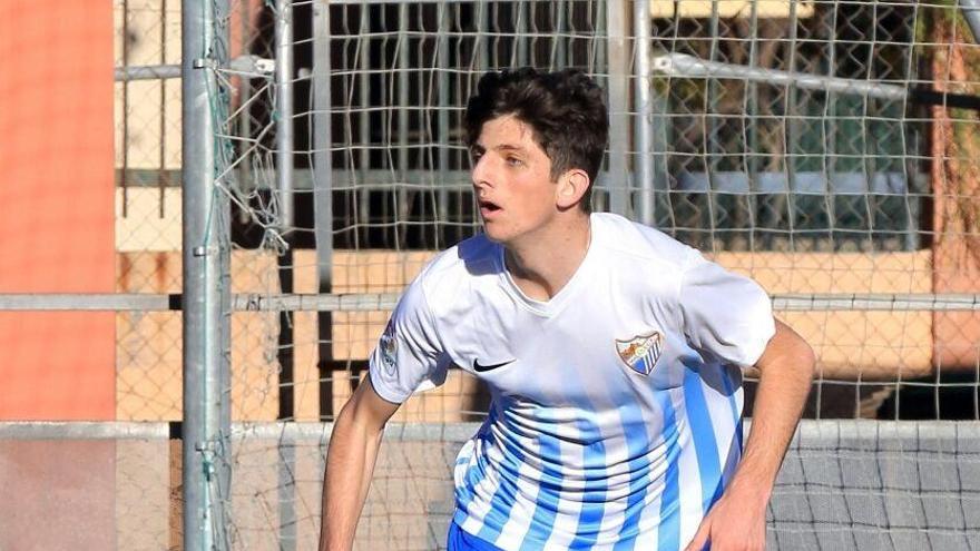 Cristóbal, en un partido con la elástica del Málaga CF en categorías inferiores.