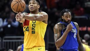 Jan 21, 2019; Milwaukee, WI, USA;  Milwaukee Bucks forward Giannis Antetokounmpo (34) reacts after the Bucks beat the Dallas Mavericks at the Fiserv Forum. Mandatory Credit: Benny Sieu-USA TODAY Sports