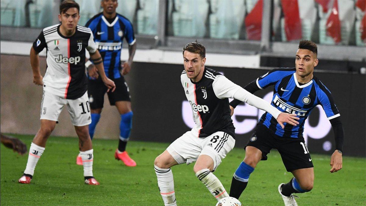 Dybala, Ramsey y Lautaro Martínez en el partido entre Inter y Juventus de la Serie A disputado a puerta cerrada el pasado 8 de marzo