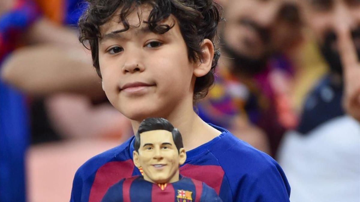 Un seguidor del Barça, con una imagen de Leo