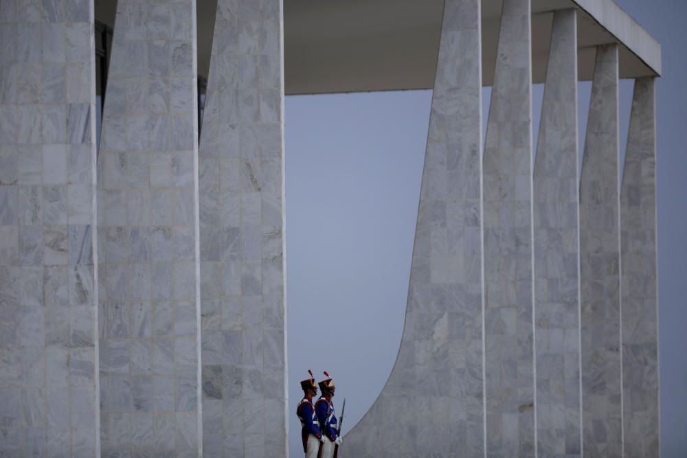 Soldiers of the presidential guard are seen in ...