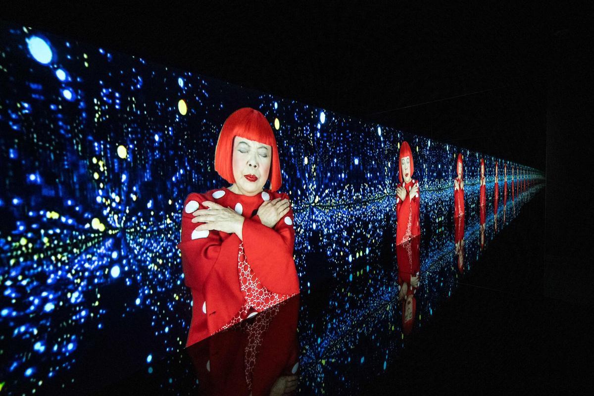 (FILES) A video projection of "Song of a Manhattan Suicide Addict" by Japanese artist Yayoi Kusama is seen during the media preview of the exhibition "I would overcome death and go on living" at Yayoi Kusama Museum in Tokyo on October 16, 2024. Japanese avant-garde artist Yayoi Kusama, known as the "polka dot queen", has died aged 97, a statement from her company said on August 27, 2026. (Photo by Philip FONG / AFP) / RESTRICTED TO EDITORIAL USE - MANDATORY MENTION OF THE ARTIST UPON PUBLICATION - TO ILLUSTRATE THE EVENT AS SPECIFIED IN THE CAPTION. RESTRICTED TO EDITORIAL USE - MANDATORY MENTION OF THE ARTIST UPON PUBLICATION - TO ILLUSTRATE THE EVENT AS SPECIFIED IN THE CAPTION