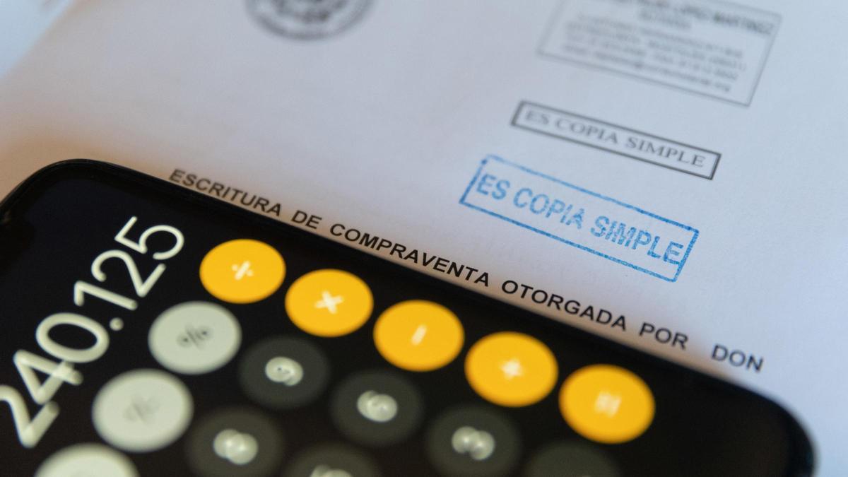 Un document de compravenda d'un habitatge.