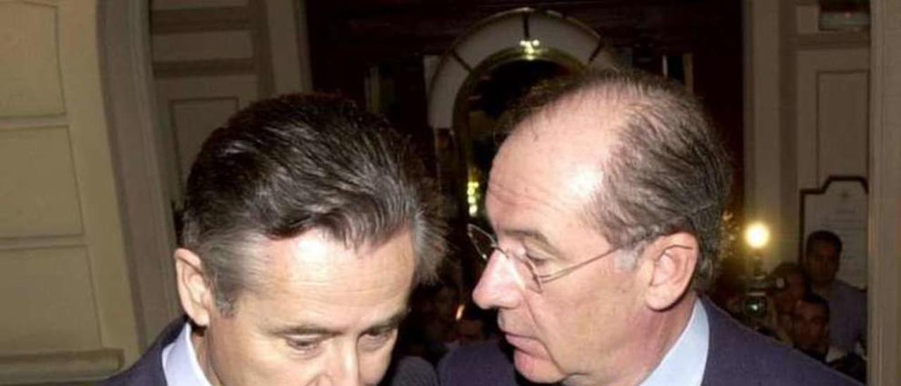 Miguel Blesa (izq.) y Rodrigo Rato, en una imagen de 2002. // Efe