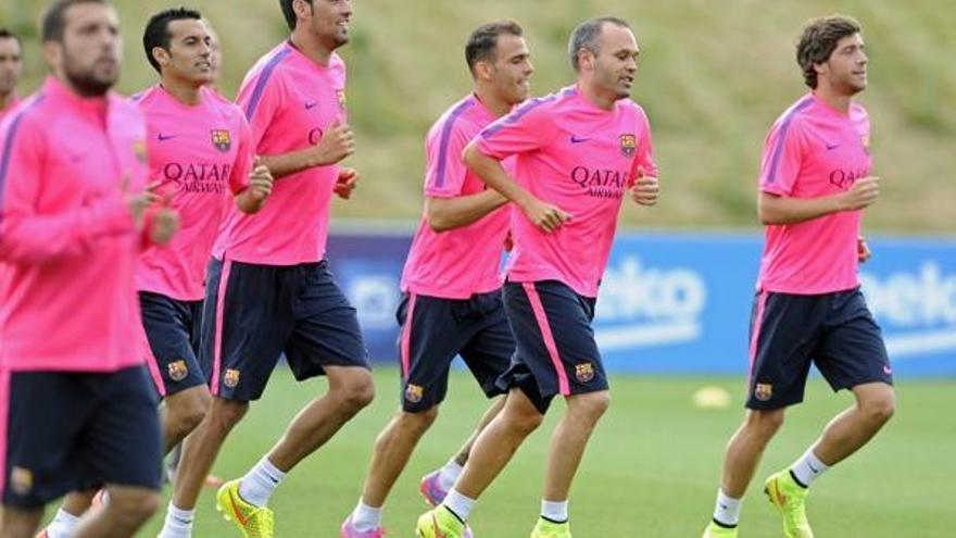 Jugadors del Barça durant l&#039;entrenament d&#039;ahir a la tarda