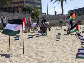 Plantada de banderas en Can Pere Antoni para denunciar el genocidio en Gaza