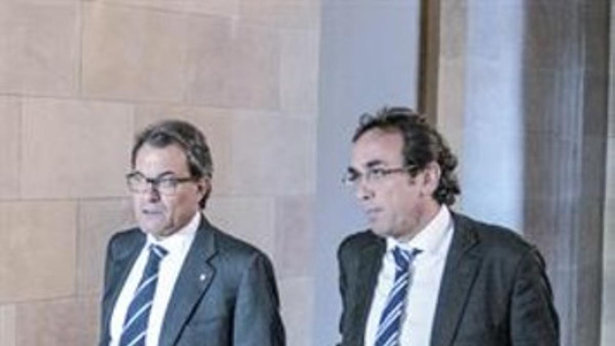 En el Parlament  El 'president' Artur Mas y el coordinador nacional de CDC, Josep Rull, en noviembre.