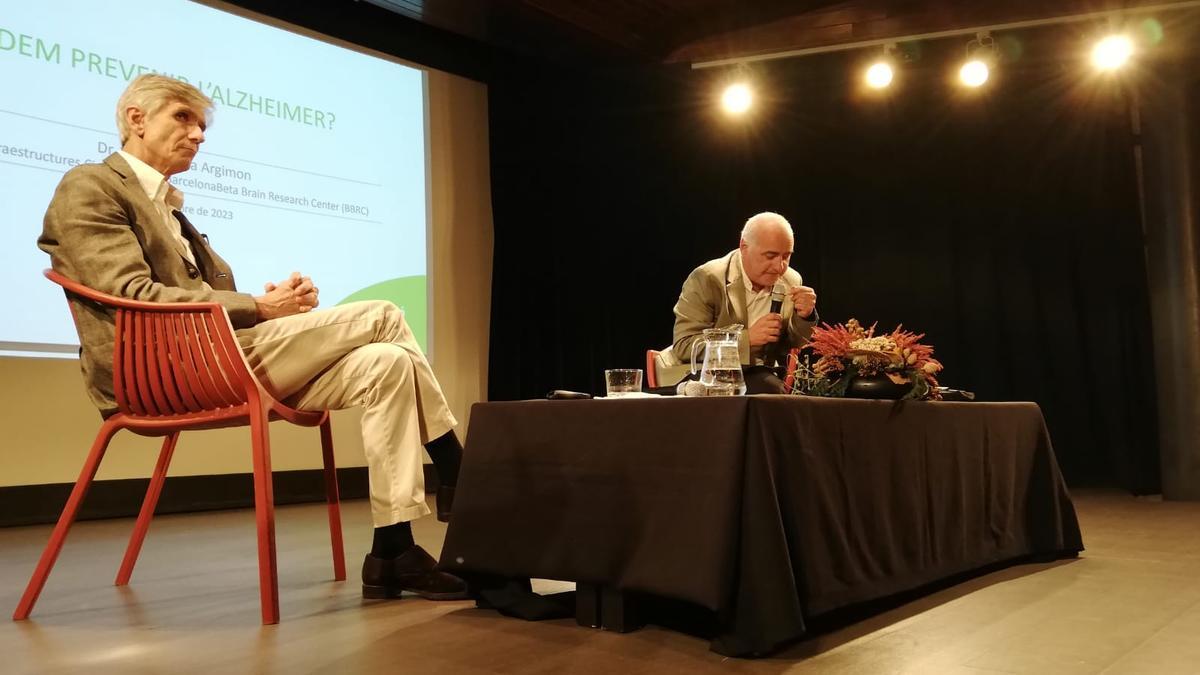 Josep Maria Argimon i Pep Garcia en l'acte d'ahir a l'aditori de la Plana de l'Om