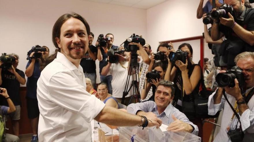 Iglesias sale &quot;a ganar&quot; pero tiende la mano al PSOE