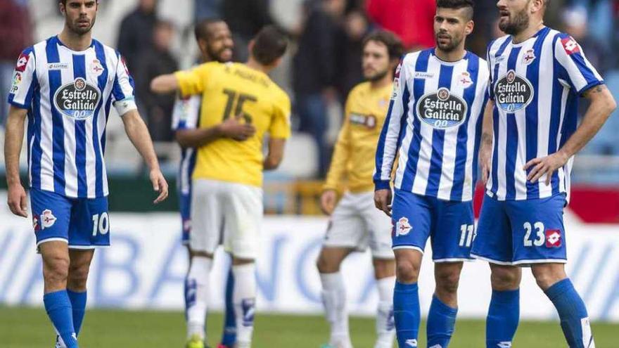 Juan Domínguez, Juanfran y Lopo, a la conclusión del partido contra el Espanyol.