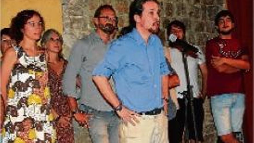 Pablo Iglesias, en primer terme, amb Joan Herrera al seu darrere