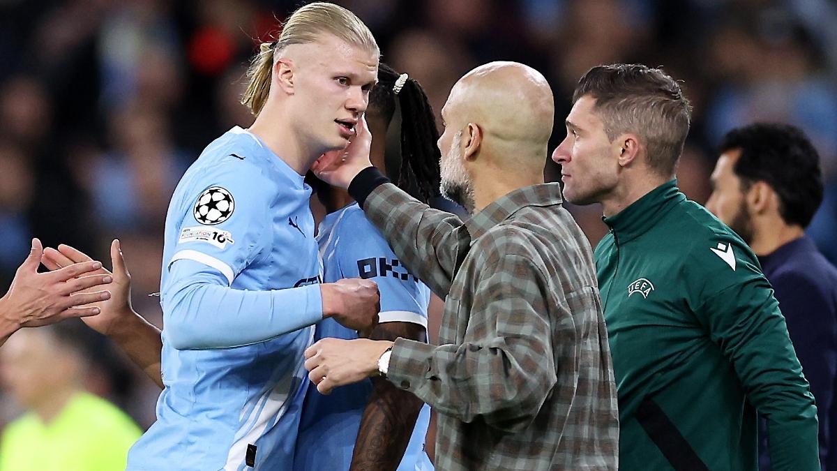 Haaland, junto a Guardiola, en el duelo contra el Madrid
