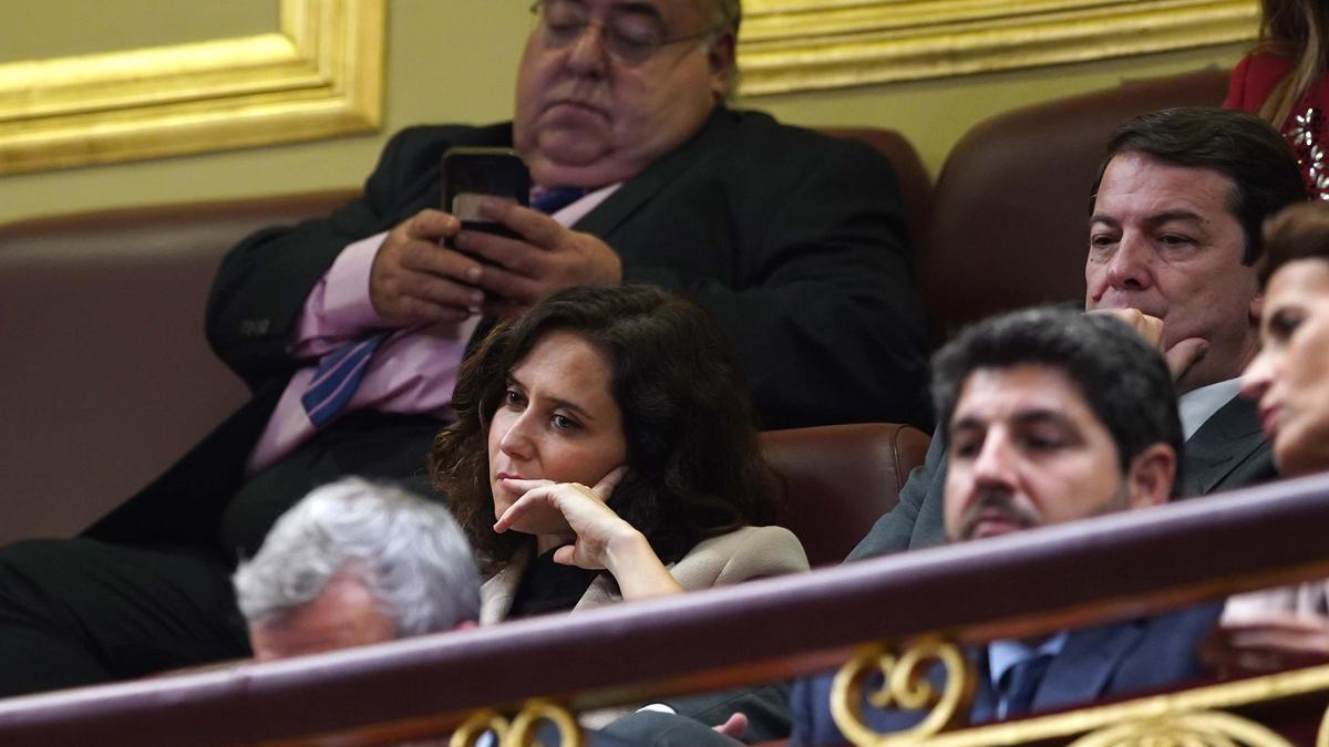 Madrid 15/11/2023 Isabel Díaz Ayuso junto a otros presidentes autonómicos del PP durante la primera sesión del debate de Investidura que se celebra estos días en el Congreso de los Diputados Imagen DAVID CASTRO