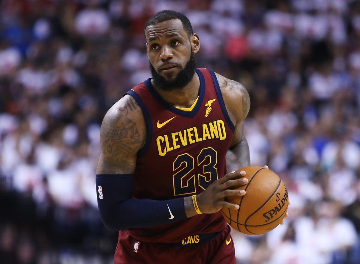 TORONTO, ON - MAY 01: LeBron James #23 of the Cleveland Cavaliers dribbles the ball in the second half of Game One of the Eastern Conference Semifinals against the Toronto Raptors during the 2018 NBA Playoffs at Air Canada Centre on May 1, 2018 in Toronto, Canada. NOTE TO USER: User expressly acknowledges and agrees that, by downloading and or using this photograph, User is consenting to the terms and conditions of the Getty Images License Agreement.   Vaughn Ridley/Getty Images/AFP