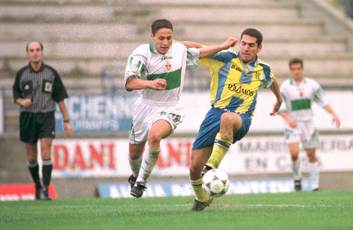 Pujol i Dani Borreguero, en un Palamós-Elx de Segona B del curs 1998-99