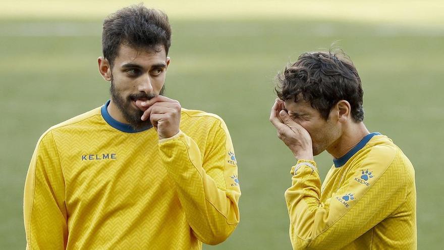 Borja Iglesia y Esteban Granero, durante un entrenamiento cuando jugaron juntos en el Espanyol