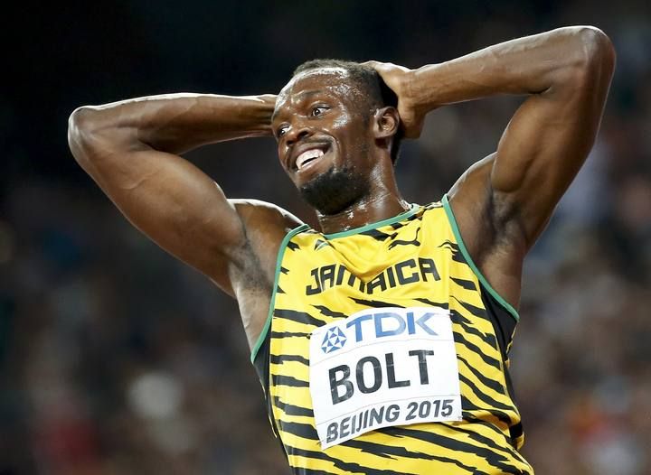 Bolt of Jamaica reacts after winning the men's 4x100m relay during the 15th IAAF World Championships at the National Stadium in Beijing