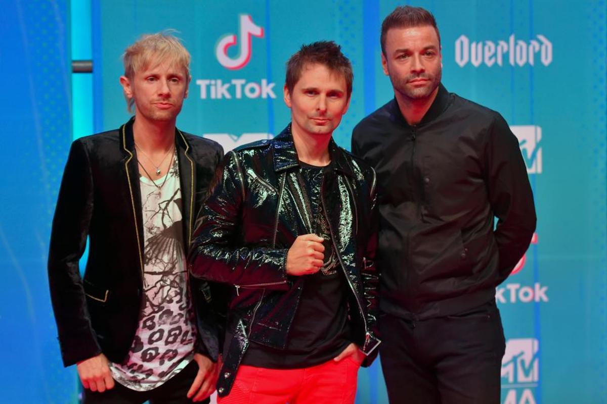 English band Muse pose on the red carpet ahead of the MTV Europe Music Awards at the Bizkaia Arena in the northern Spanish city of Bilbao on November 4, 2018. (Photo by ANDER GILLENEA / AFP)