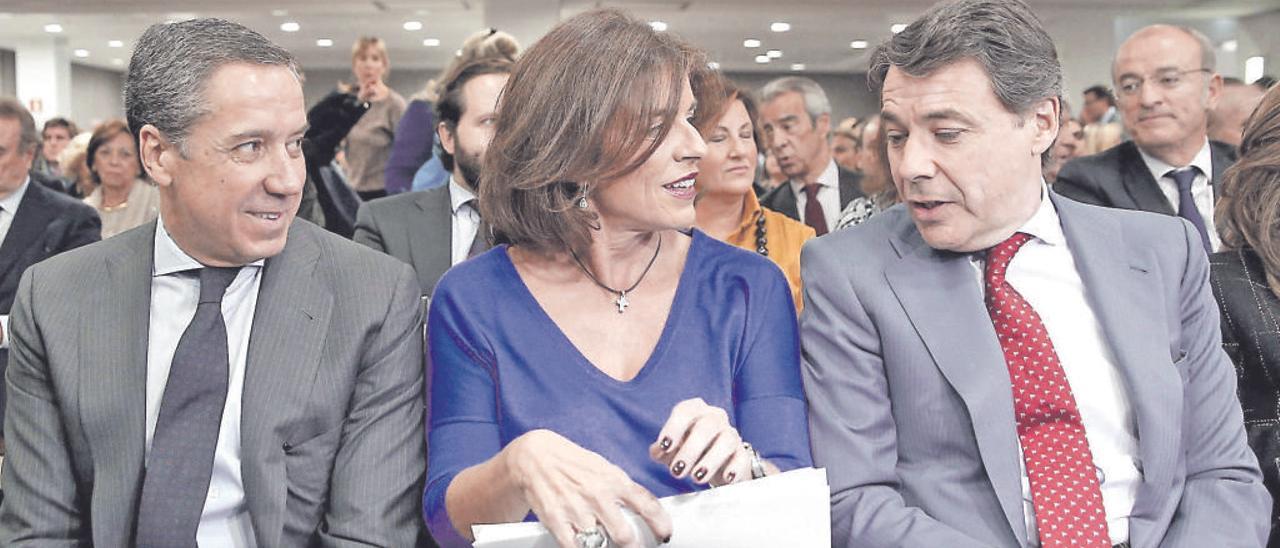 Eduardo Zaplana, Ana Botella e Ignacio González en Madrid en 2013.