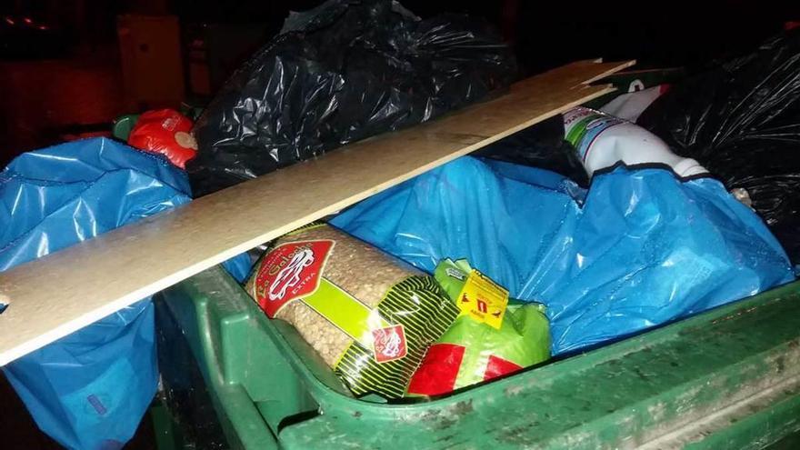 Encuentran un contenedor lleno de comida en buen estado en Pola de Lena -  La Nueva España