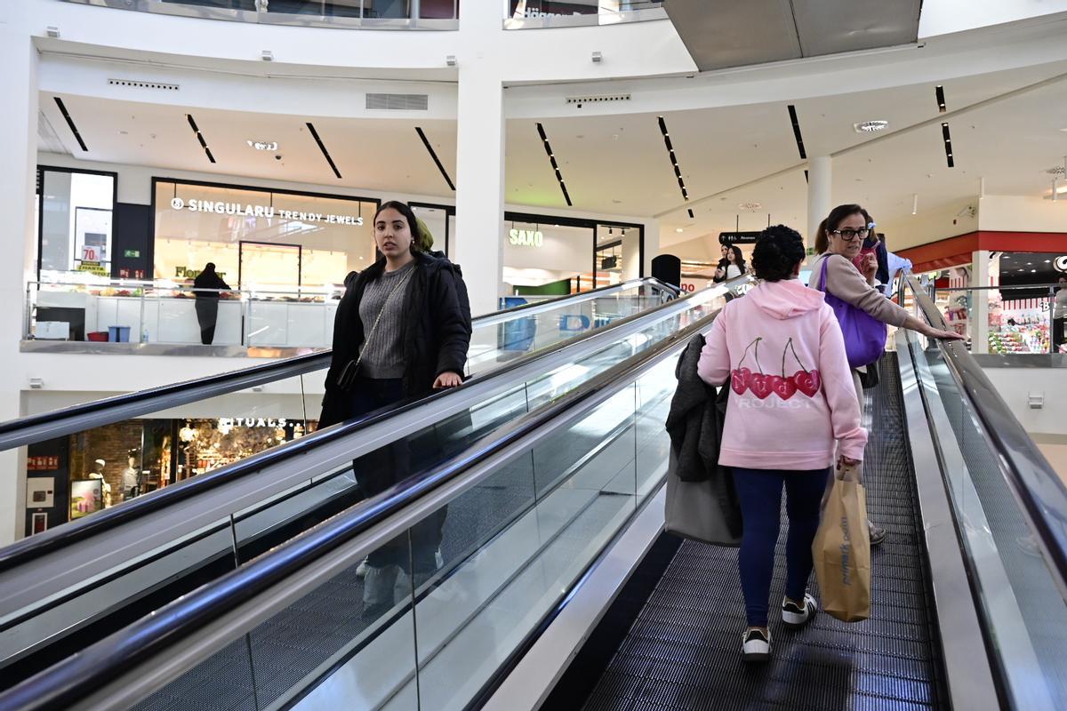 De compras.