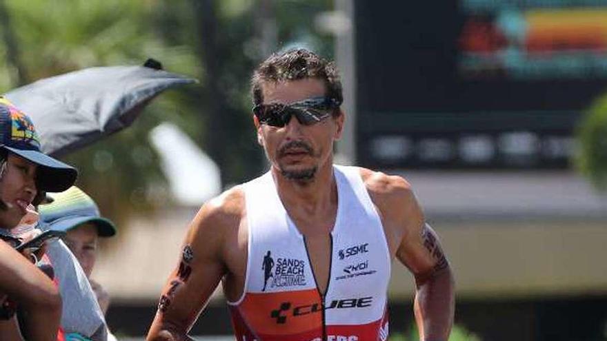 Iván Raña, durante sus últimos metros de carrera. // Efe